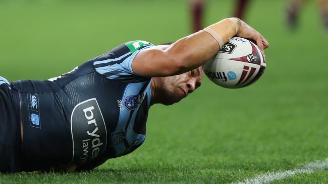 Tyson Frizell slams the ball down. Picture: Brett Costello