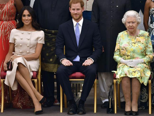 Meghan Markle, Prince Harry and the Queen. Picture: AP