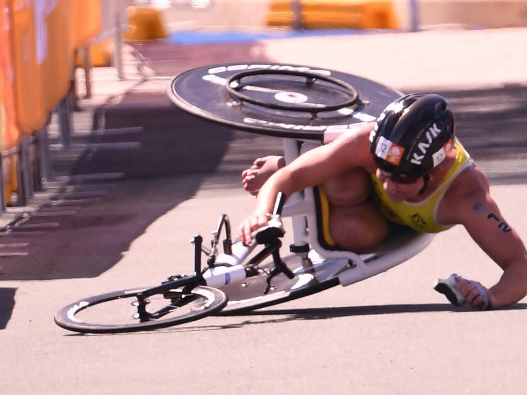 Lauren Parker drew praise for her response to this crash during the triathlon  as she went on to claim bronze. Picture: AAP Image/Dean Lewins