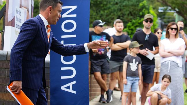 SYDNEY, AUSTRALIA - FEBRUARY 20, 2021, Auctioneer Damien Cooley in action at Service Street Home Auction in Ashfield Today in Sydney, Australia. Picture: Newscorp Sunday Telegraph / Gaye Gerard