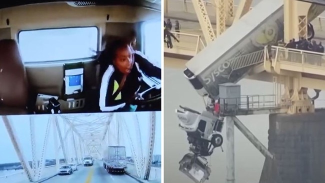 Horrifying footage shows the moment a truck was left dangling from a US bridge after a crash.