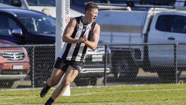 Jake Richardson celebrates a goal for Narre Warren. Picture: Valeriu Campan