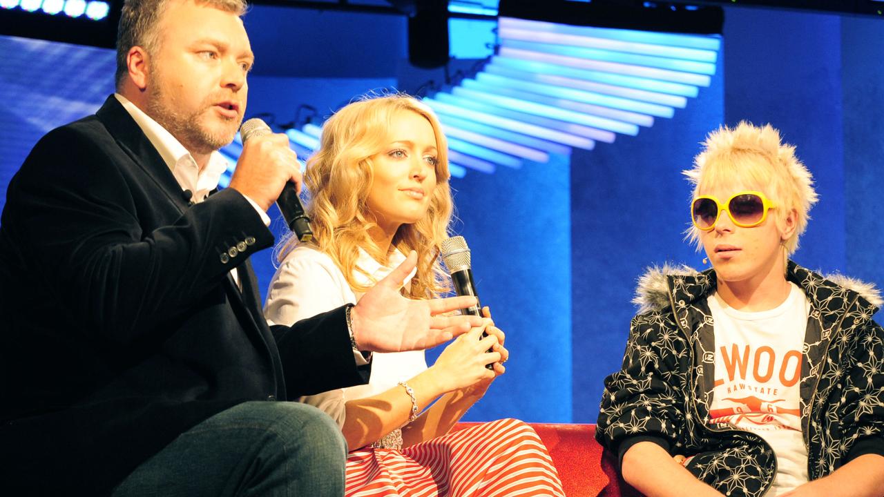 Corey Worthington with Channel 10 Big Brother hosts Kyle Sandilands and Jackie O during the filming of the reality show at Dreamworld on Queensland's Gold Coast.