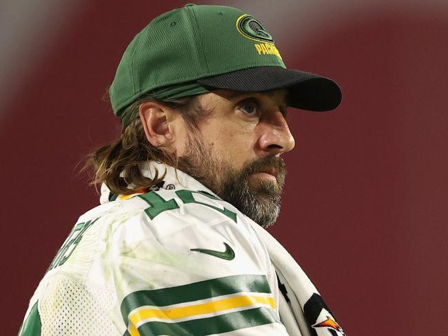 GLENDALE, ARIZONA - OCTOBER 28: Quarterback Aaron Rodgers #12 of the Green Bay Packers watches from the sidelines during the second half of the NFL game at State Farm Stadium on October 28, 2021 in Glendale, Arizona. The Packers defeated the Cardinals 24-21.  (Photo by Christian Petersen/Getty Images)