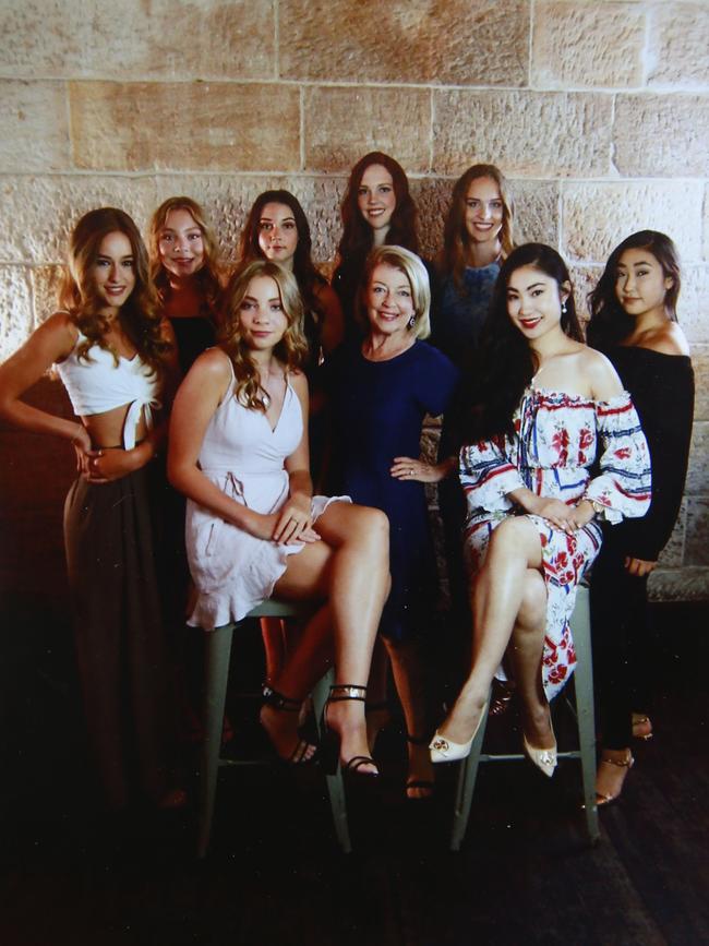 Etiquette Coach and operator of the Sydney Model Agency Val Edwards with a group of recent students.