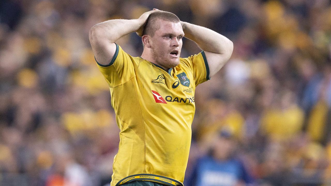 Tom Robertson of the Wallabies holds his head during the first Bledisloe Cup match.
