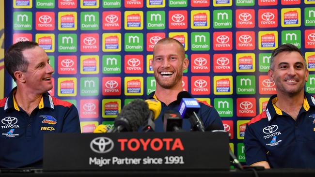 Don Pyke, Scott Thompson and Scott Camporeale during a press conference where Thompson announced he would retire from football at the end of the season. Picture: Morgan Sette (AAP).