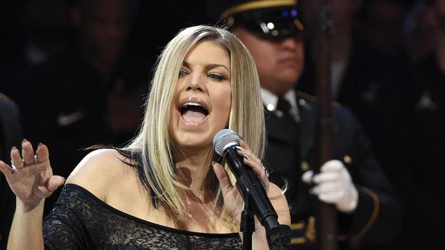 Singer Fergie performs the national anthem prior to an NBA All-Star basketball game, Sunday, Feb. 18, 2018, in Los Angeles. (AP Photo/Chris Pizzello)