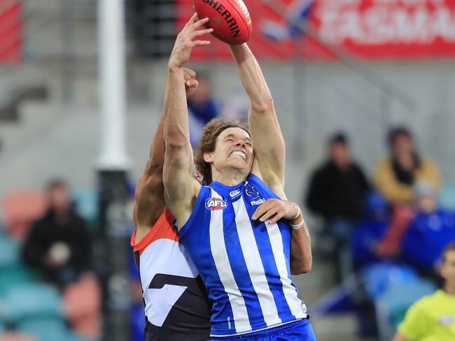 Ben Brown stretches for a mark against GWS.