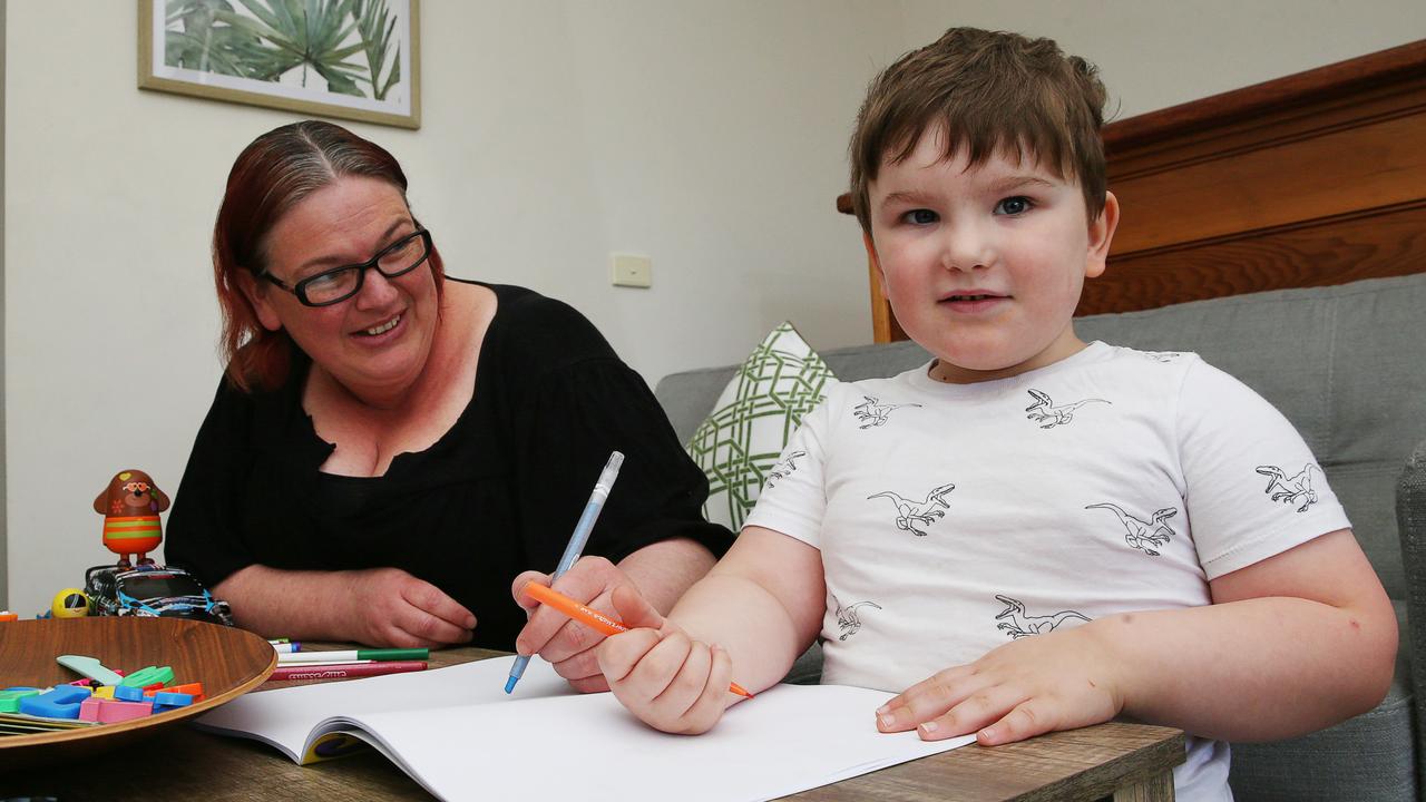 Archie Sexton and his mum Kate Spencer at Gateways Early Intervention Therapy Playgroup, which helps young kids with special needs. .