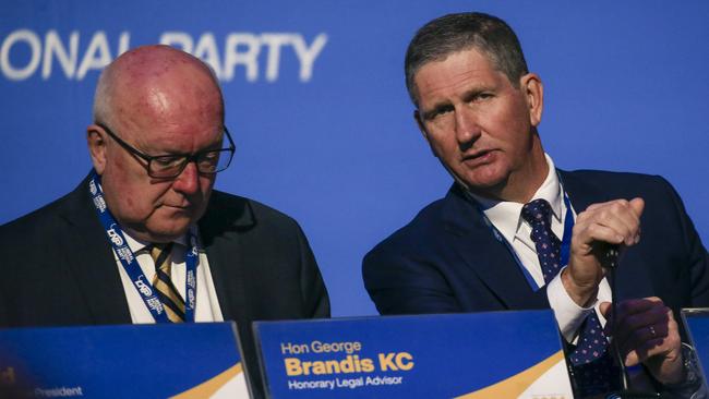 LNP president Lawrence Springborg (right) with legal adviser George Brandis on day one of the convention. Picture: Glenn Campbell/NCA NewsWire