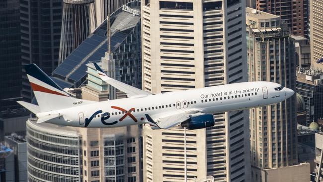 Rex sent its 737 over Sydney's CBD to mark Australia Day, 2021 and promote its upcoming flights from Melbourne to the city. Picture: Joe Corrigan