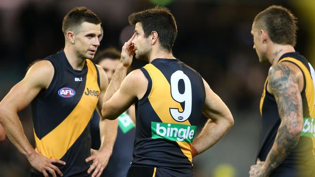 Trent Cotchin, Brett Deledio and Dustin Martin after the shock loss to Port Adelaide. Picture: Getty