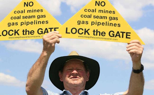 Protester John makes his point at Bunjurgen Estate Vineyard yesterday.