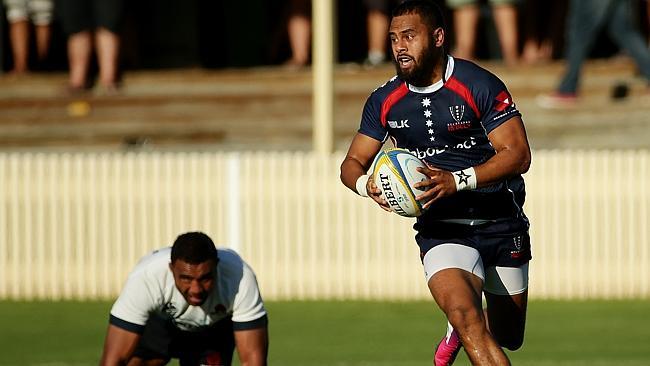 Rebels winger Telusa Veainu leaves Waratahs backrower Wycliff Palu in his wake in making a break.