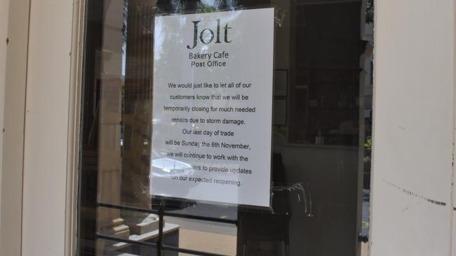 Closed sign on the windows of the Jolt Bakery Cafe "Post Office".