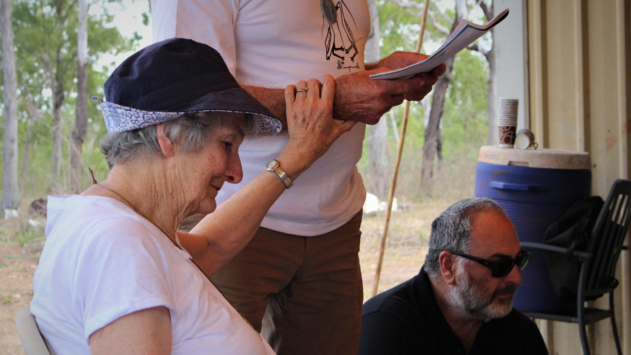 An emotional Alan McColl is comforted by wife Joan McColl during a ceremony in east Arnhem Land last week. Picture: Jason Walls