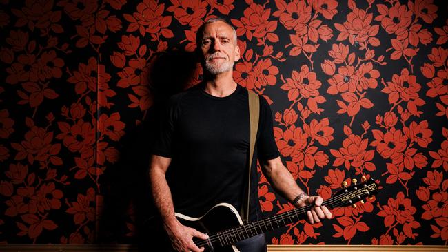 Former SAS trooper and musician Harry Moffitt with his guitar. Picture: Nadir Kinani