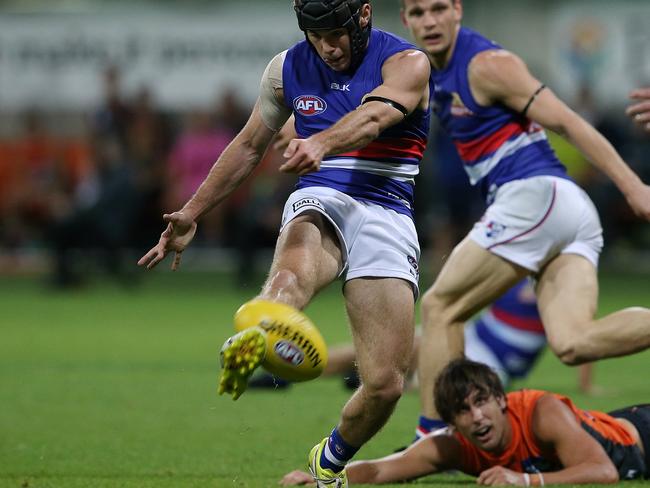 Caleb Daniel throws the ball on the boot. Picture: Wayne Ludbey