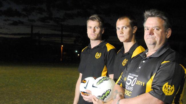 Sunday’s six-goal star Mark Burbridge, pictured in the middle of Rob Groth and Elizabeth Vale chairman Steve Woodward, in 2012.