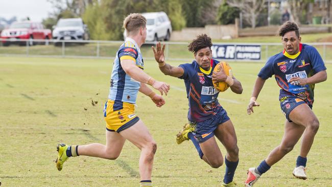 Benji Neliman scores a try for Western Mustangs. Picture: Nev Madsen.