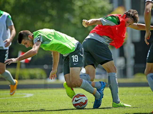 Mark Milligan makes a strong tackle on Terry Antonis.