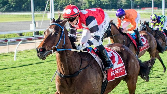 Mahagoni, ridden by jockey Georgina Cartwright, wins the 2100 metre Cairns Cup, held at the Cairns Jockey Club, Cannon Park, Woree. Picture: Peter Roy