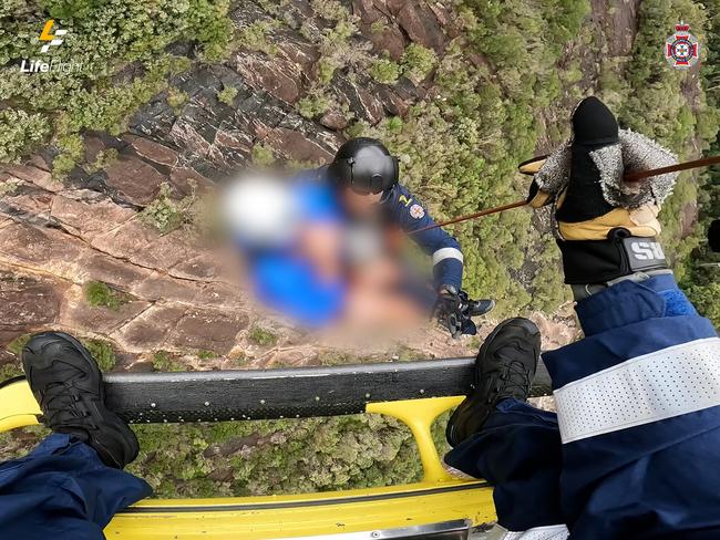 A hiker was winched to safety from Mt Beerwah in the Glasshouse Mountains after reportedly suffering a broken ankle. Photo: LifeFlight