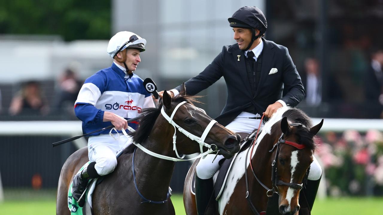 James McDonald riding Atishu is interviewed by Billy Slater. Photo by Quinn Rooney/Getty Images.