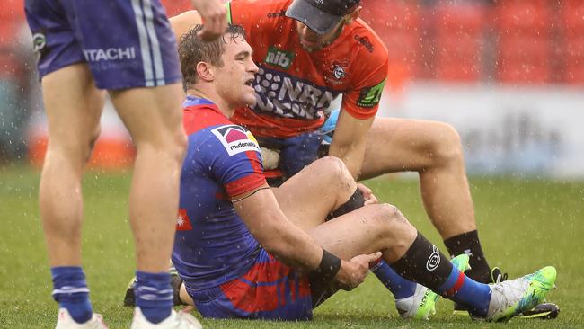 Connor Watson of the Knights injured during the round 11 match against the Bulldogs last year. Photo: Mark Kolbe/Getty Images