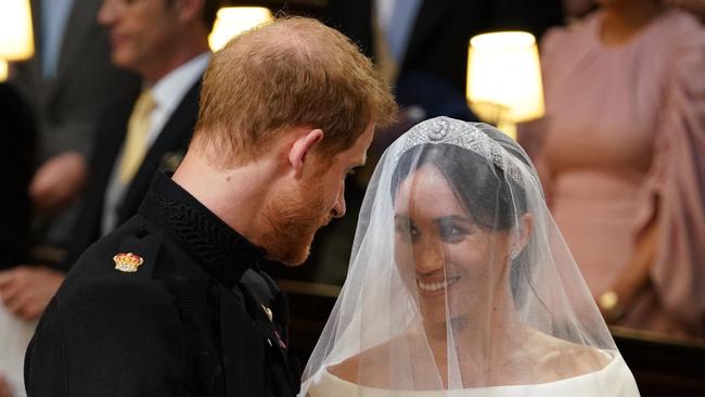 Prince Harry and his bride couldn’t keep their eyes off each other.