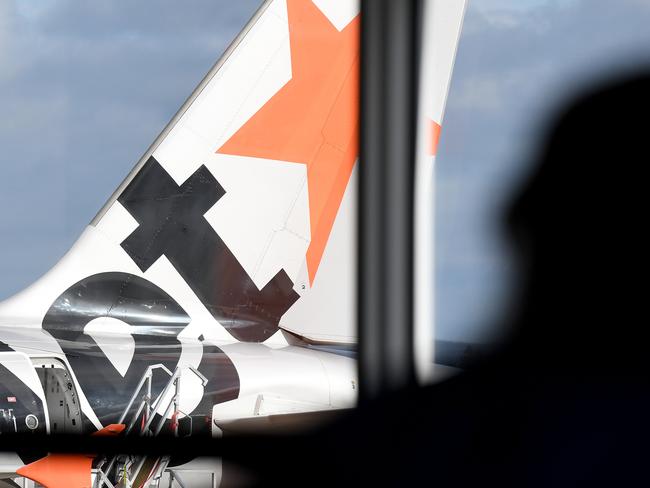 SYDNEY, AUSTRALIA - NCA NewsWire Photos JULY, 28, 2020: A Jetstar Aircraft is seen on the tarmac at Sydney Airport. An infectious woman who flew from Melbourne to Sydney, on Jetstar flight JQ506 on July 25th, has tested positive to COVID-19 (Coronavirus). Picture: NCA NewsWire / Bianca De Marchi