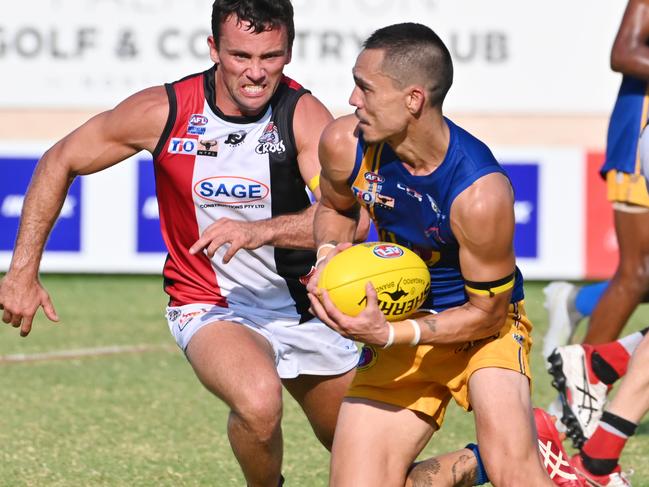 Southern Districts skipper Dean Staunton bears down on Wanderers captain Braedon McLean. Picture: Julianne Osborne