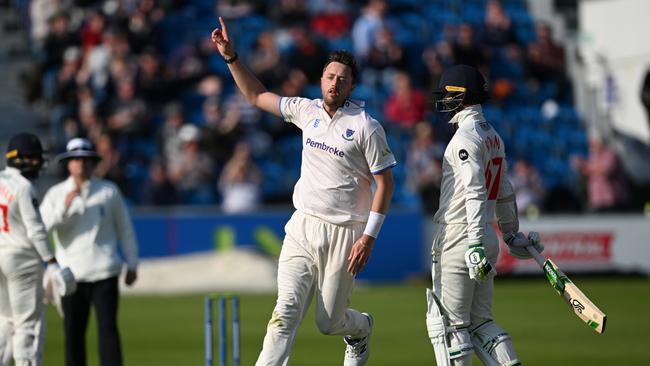 Ollie Robinson celebrates a wicket in the County Championship.