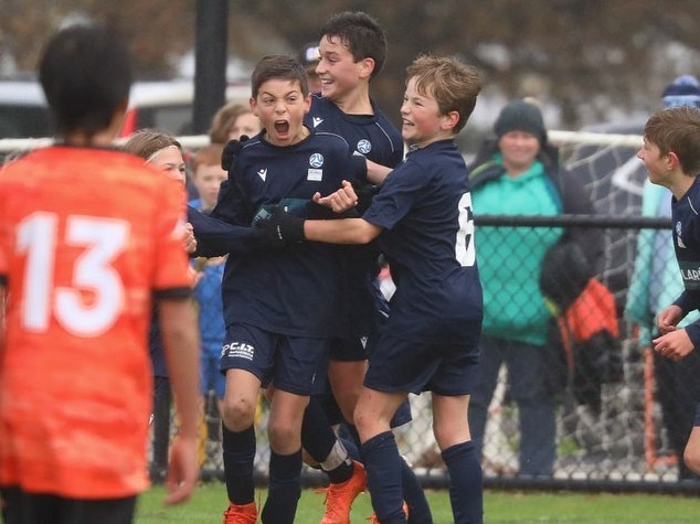 Geelong players celebrate during last year's Country Championships in Ballarat. Picture: Rebecca Horrocks from Soccer Shots Photography