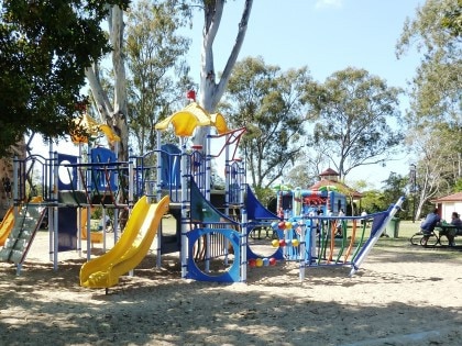 The playground at Bischoff Park at Nerang before the large shady trees were removed.