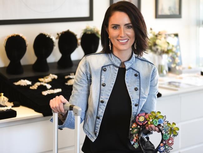 Ashlee Kalantarian with some of the headwear accessories designed by her for her Ashlee Lauren Designs label. Picture: Supplied.