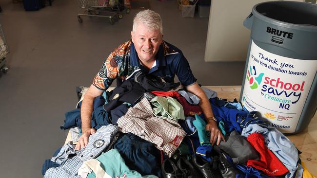 Volunteer Richard Beedham, sorts through the donated school uniforms at the Vinnies Donation Hub. Picture: Shae Beplate.