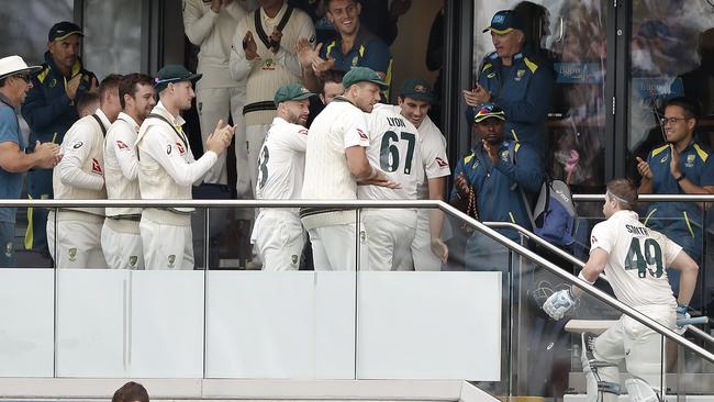 The Aussie players await the arrival of Steve Smith.