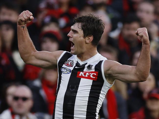 MELBOURNE , AUSTRALIA. April 25, 2024.  AFL.. Anzac Day.  Essendon vs Collingwood at the the MCG.   Lachie Schultz of the Magpies celebrates a 3rd quarter goal   . Pic: Michael Klein