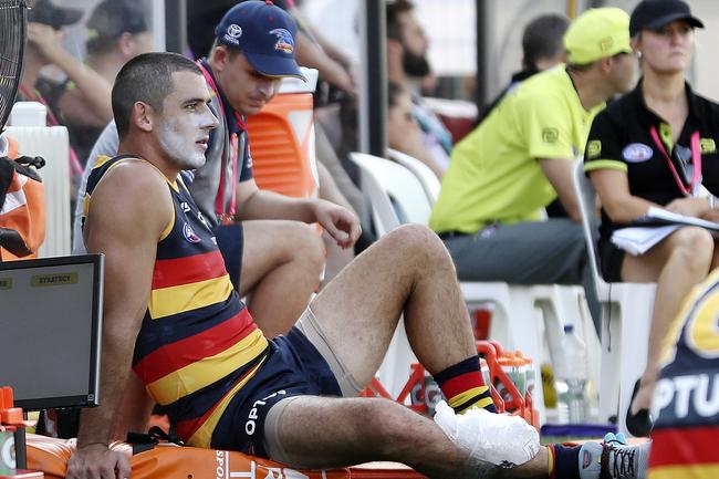 Crows captain Taylor Walker on the side-lines with ice on his shin/calf at Port Pirie. Picture SARAH REED