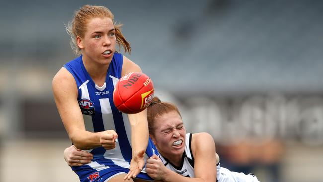 Mia King of the Kangaroos is tackled by Alana Porter of the Magpies during the 2020 AFLW Semi Final match between the North Melbourne Kangaroos and the Collingwood Magpies at Ikon Park on March 21, 2020 in Melbourne, Australia. (Photo by Dylan Burns/AFL Photos via Getty Images)