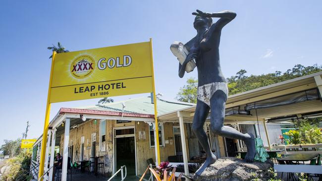 The Leap Hotel and its statue of an indigenous woman said to have jumped off a nearby cliff with her baby, rather than be killed by native police. Picture: Lachie Millard