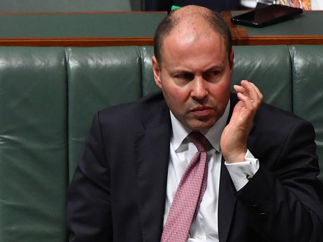 CANBERRA, AUSTRALIA - MARCH 22: Treasurer Josh Frydenberg reacts during Question Time in the House of Representatives at Parliament House on March 22, 2021 in Canberra, Australia. Australian Federal Police Commissioner Reece Kershaw has warned Prime Minister Morrison's probe into who knew what and when on the alleged rape of Brittany Higgins could interfere with the police investigation raising the prospect the political probe could be suspended. (Photo by Sam Mooy/Getty Images)