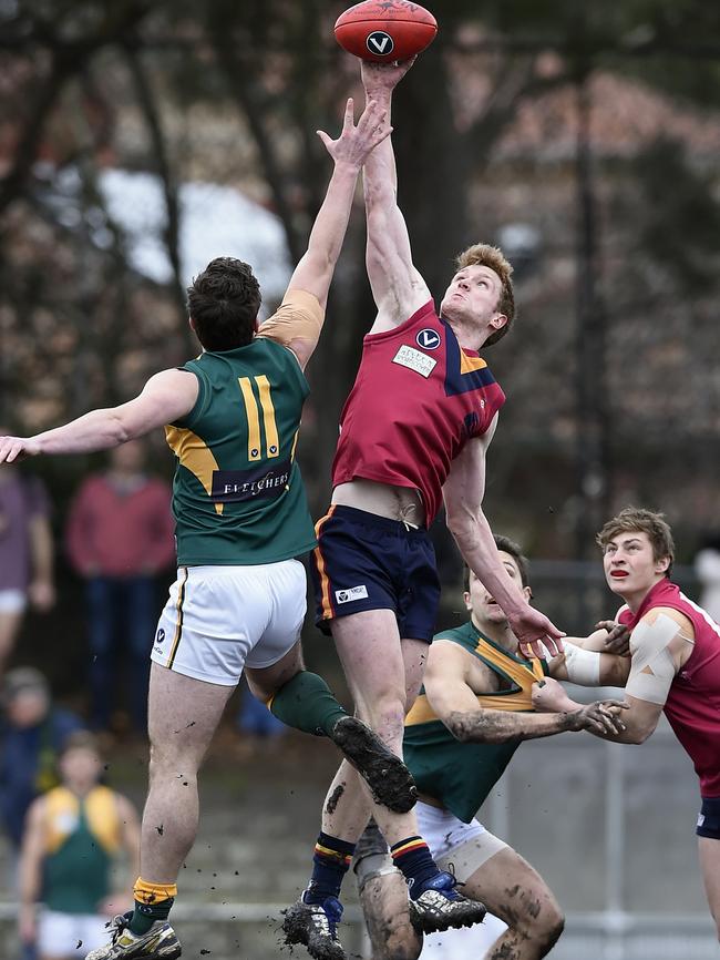 Kris Spassopoulos and Jack Hurley contest a ruck duel on Saturday. Picture: Andrew Brownbill