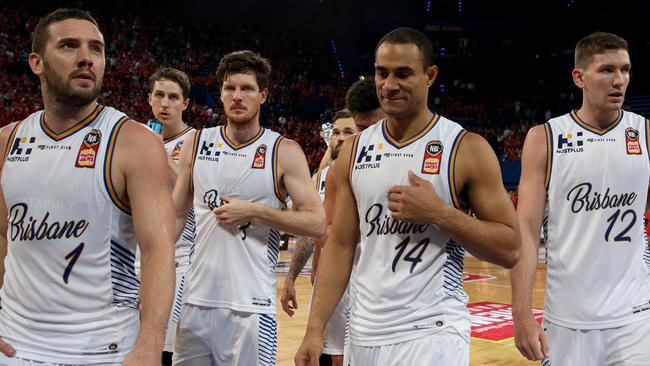 Bullets players leave the court after their heavy loss to the Wildcats in Perth on Thursday night. Picture: AAP 