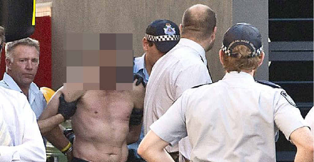 A 41-year-old Toowoomba man is taken into custody after a siege at the Department of Communities’ Child Safety Service Centre. Picture: Nev Madsen