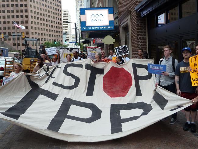 Protest ... Activists call for the rejection of the Trans-Pacific Partnership trade deal. Picture: Paul Handley/AFP