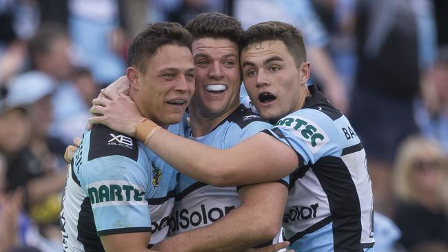 Chad Townsend of the Sharks scores and celebrates with Scott Sorensen and Kyle Flanagan. Picture: AAP Image/Craig Golding