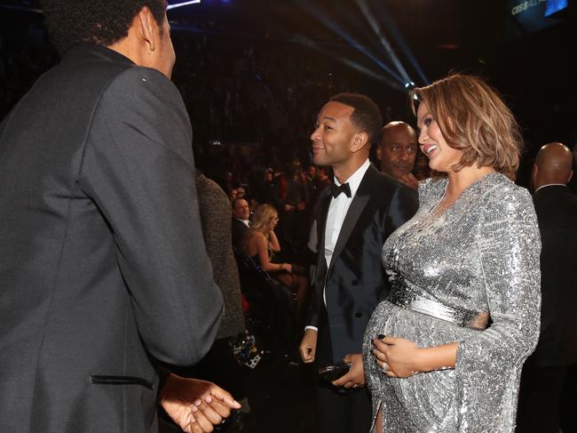 Jay-Z, John Legend and Chrissy Teigen attend the 60th Annual GRAMMY Awards at Madison Square Garden on January 28, 2018 in New York City. Picture: Getty